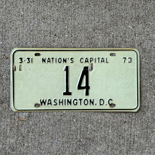 Photo of a 1973 Washington DC License Plate Auto Tag Garage Decor Vintage Low Number Two Digit 14 with original patina