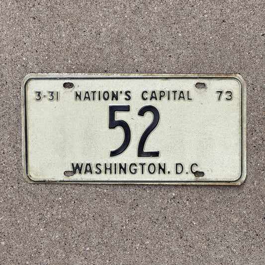 Photo of a 1973 Washington DC License Plate Auto Tag Garage Decor Vintage Low Number Two Digit 52 with original patina