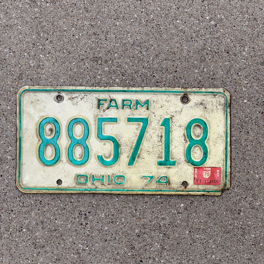 Photo of a 1974 1975 Ohio Farm License Plate Auto Tag Garage Decor Vintage 885718 with original patina