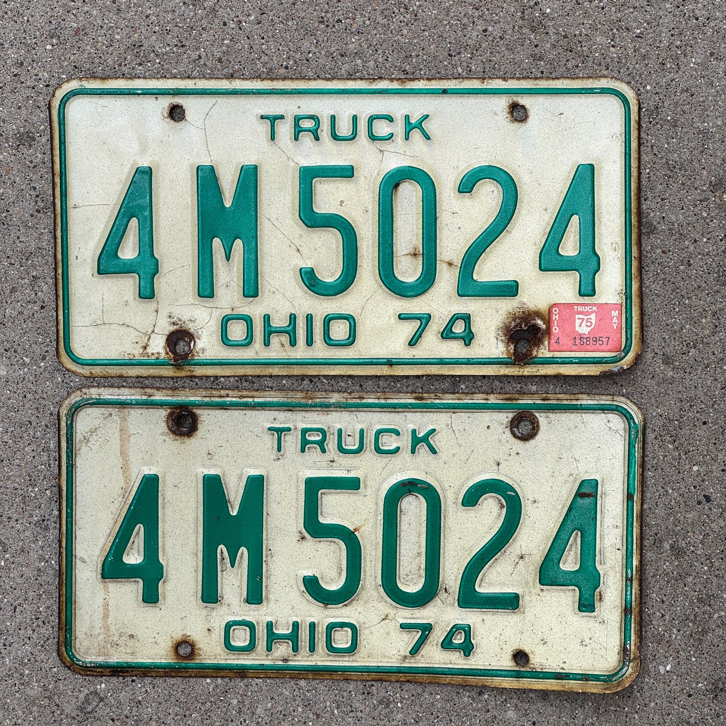 Photo of a 1974 1975 Ohio Truck License Plate Pair Auto Tag Garage Decor Vintage 4 M 5024 with original patina