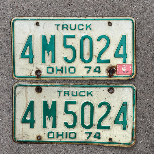 Photo of a 1974 1975 Ohio Truck License Plate Pair Auto Tag Garage Decor Vintage 4 M 5024 with original patina