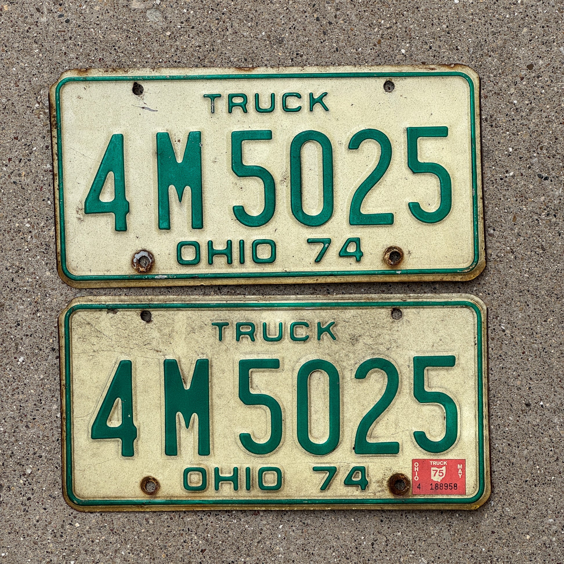 Photo of a 1974 1975 Ohio Truck License Plate Pair Auto Tag Garage Decor Vintage 4 M 5025 with original patina