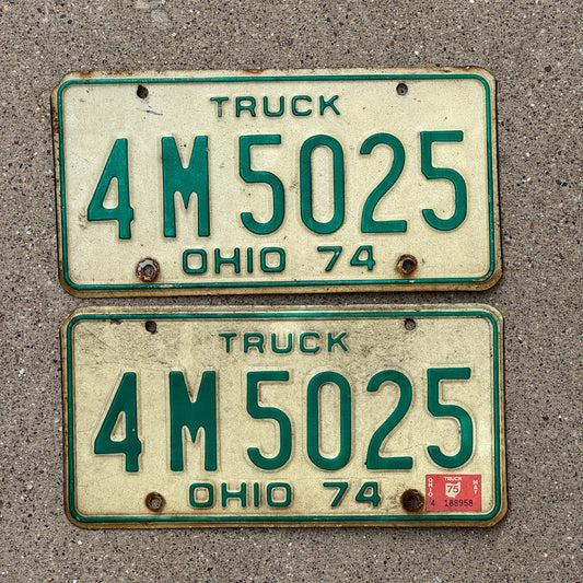 Photo of a 1974 1975 Ohio Truck License Plate Pair Auto Tag Garage Decor Vintage 4 M 5025 with original patina