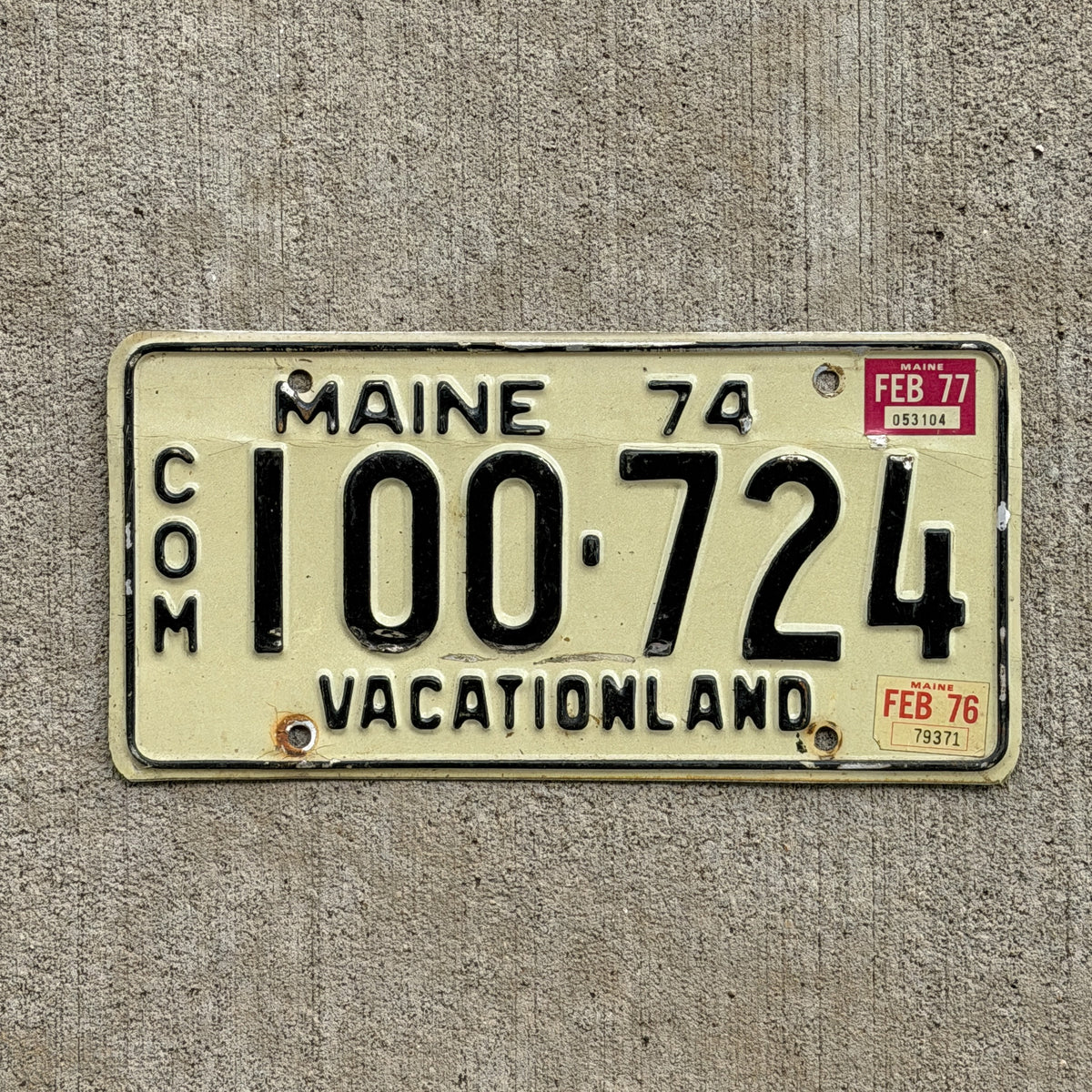 Photo of a 1974 1977 Maine Commercial License Plate Auto Tag Garage Decor Vintage 100 724 with original patina