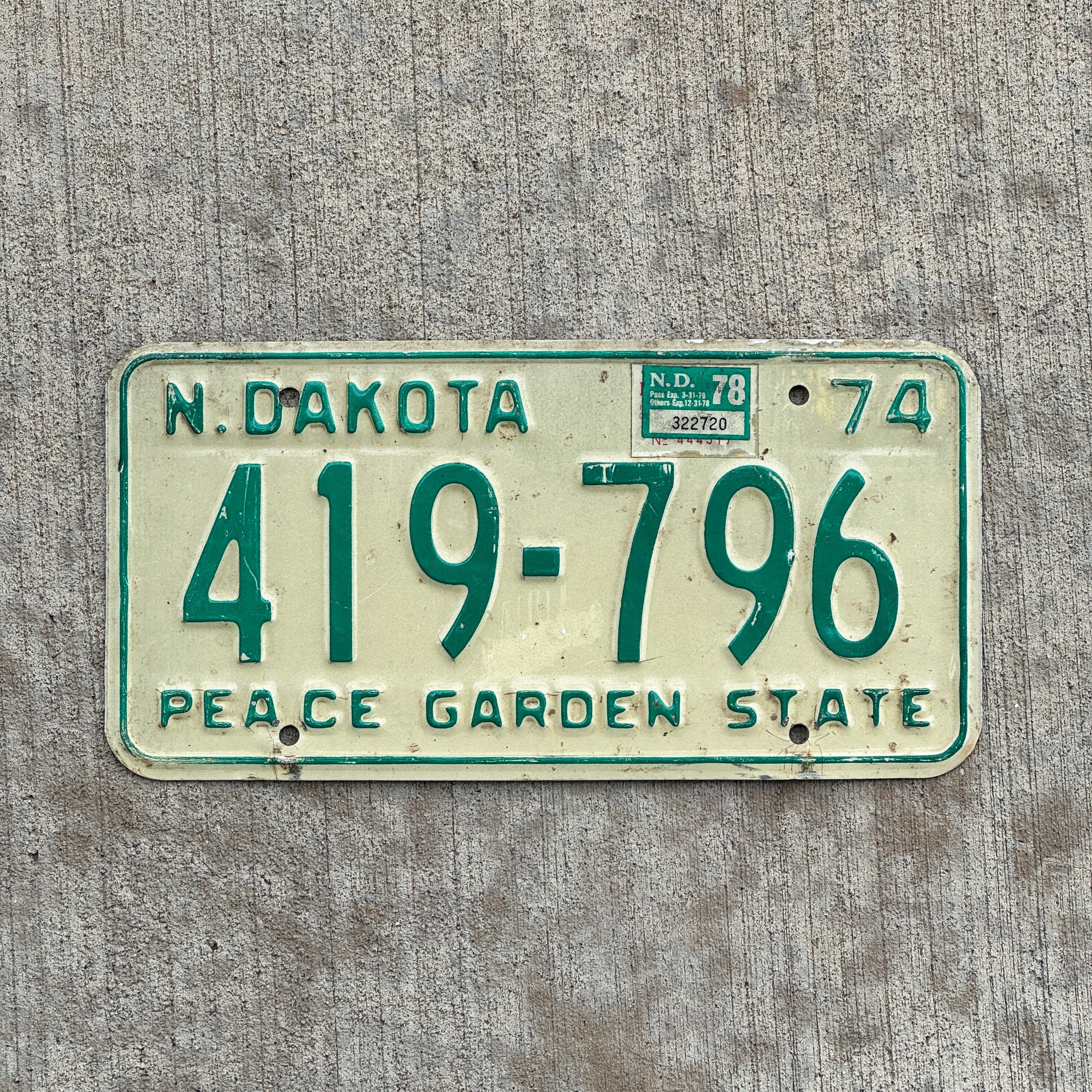 Photo of a 1974 1978 North Dakota License Plate Auto Tag Garage Decor Vintage 419 796 with original patina