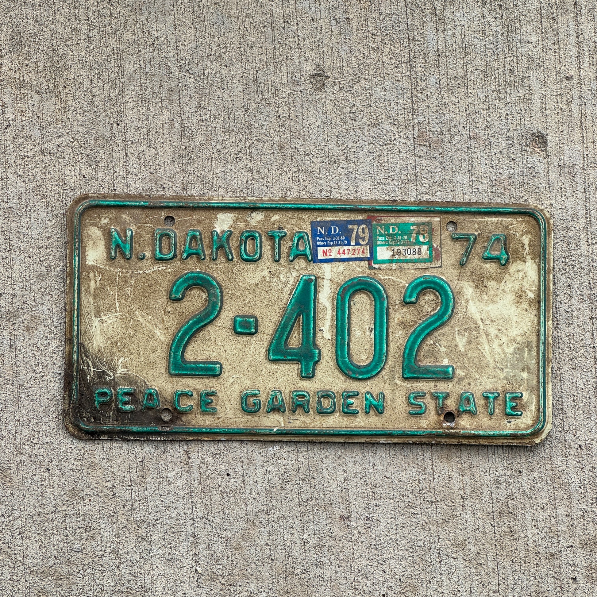 Photo of a 1974 1979 North Dakota License Plate Auto Tag Garage Decor Vintage 2 402 with original patina