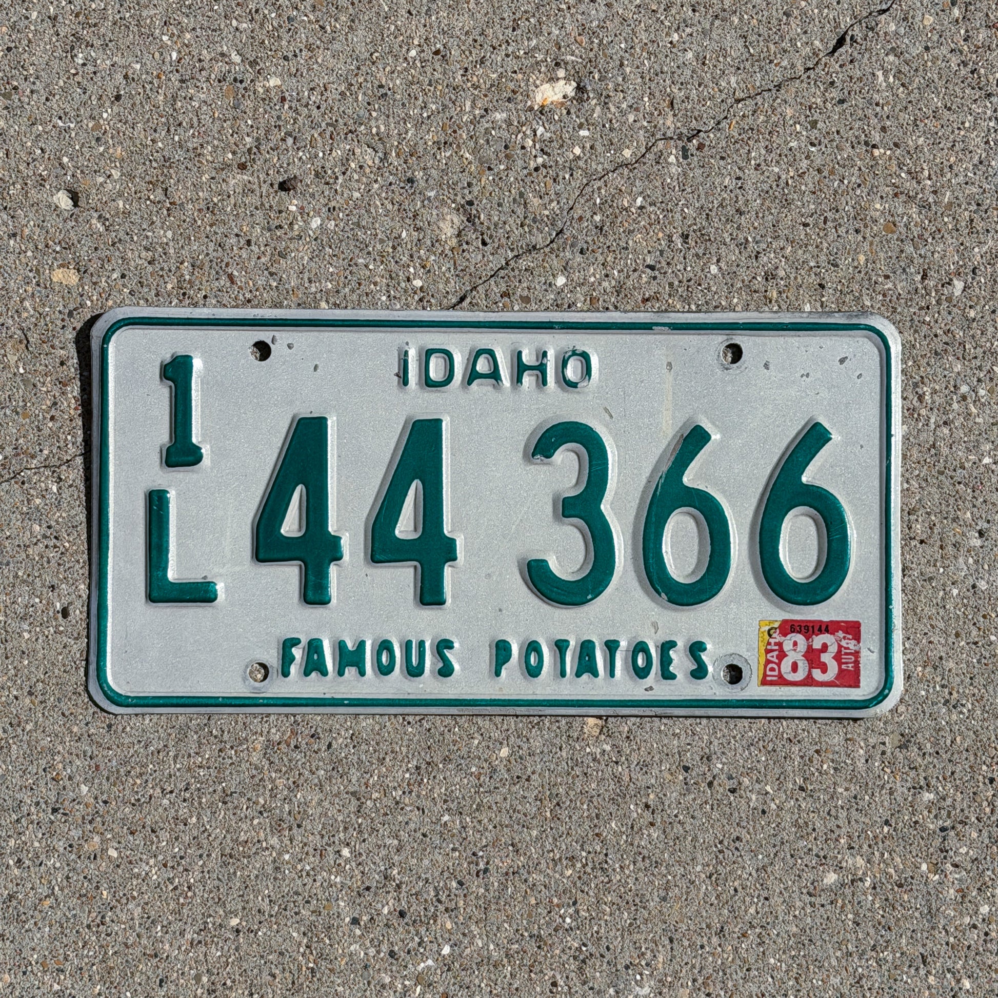 Photo of a 1974 1983 Idaho License Plate Auto Tag 2 Vintage Garage 1L 44 366 with original patina