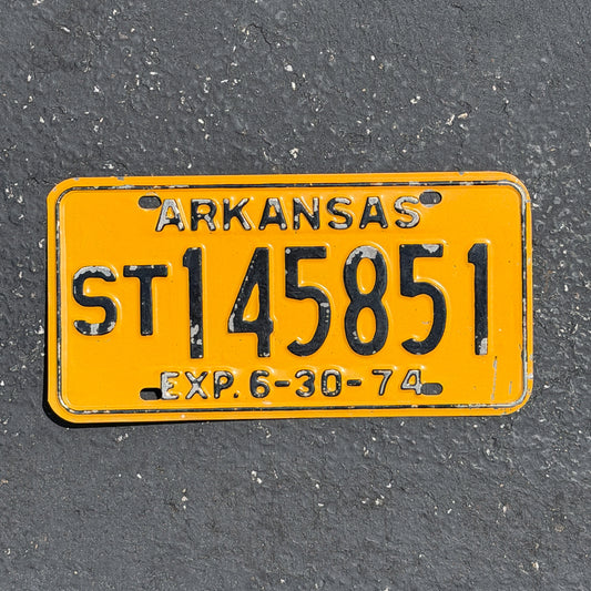 Photo of a 1974 Arkansas Semi Trailer License Plate Auto Tag Garage Decor Vintage ST 145851 with original patina