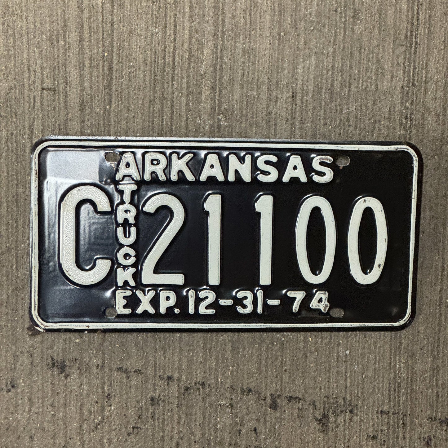 Photo of a 1974 Arkansas Truck License Plate Auto Tag Garage Decor Vintage C 21100