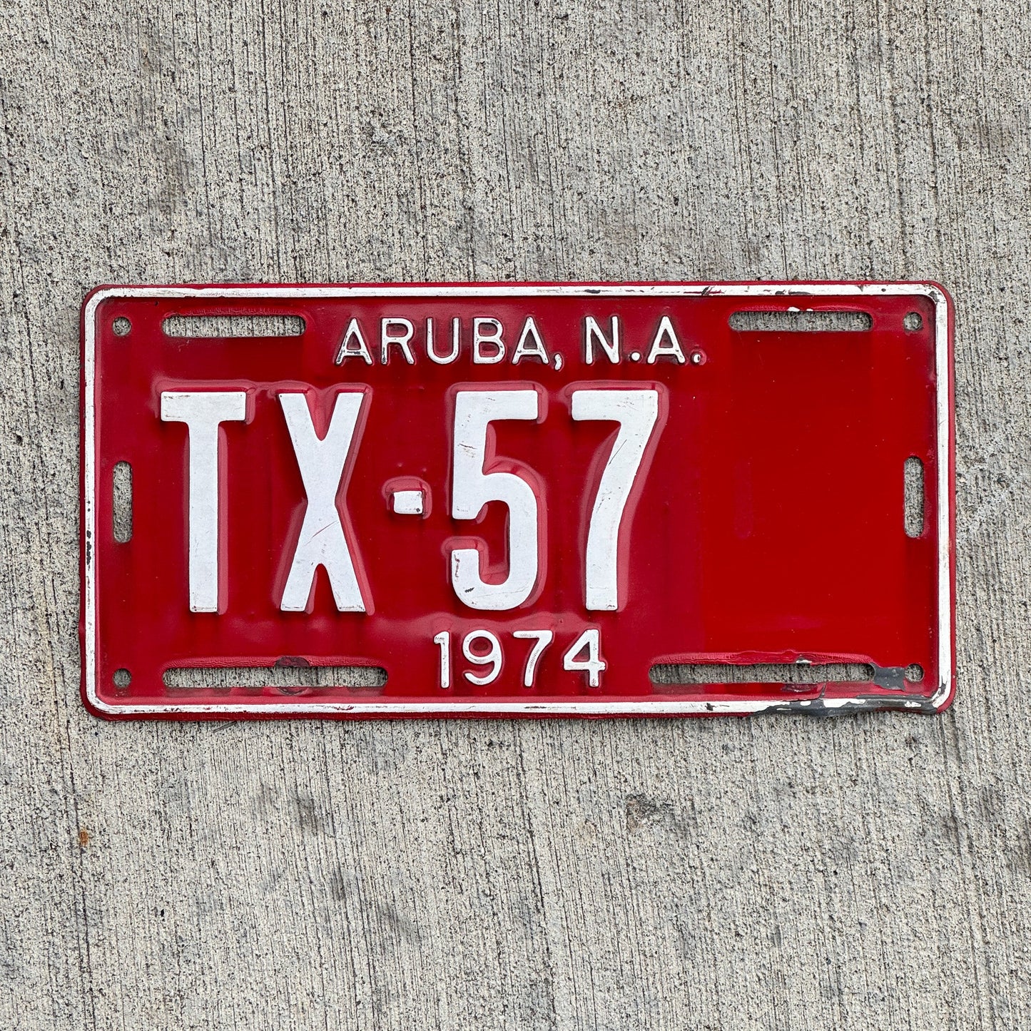 Photo of a 1974 Aruba Taxi License Plate Auto Tag Garage Decor Vintage High Quality TX 57 with original patina