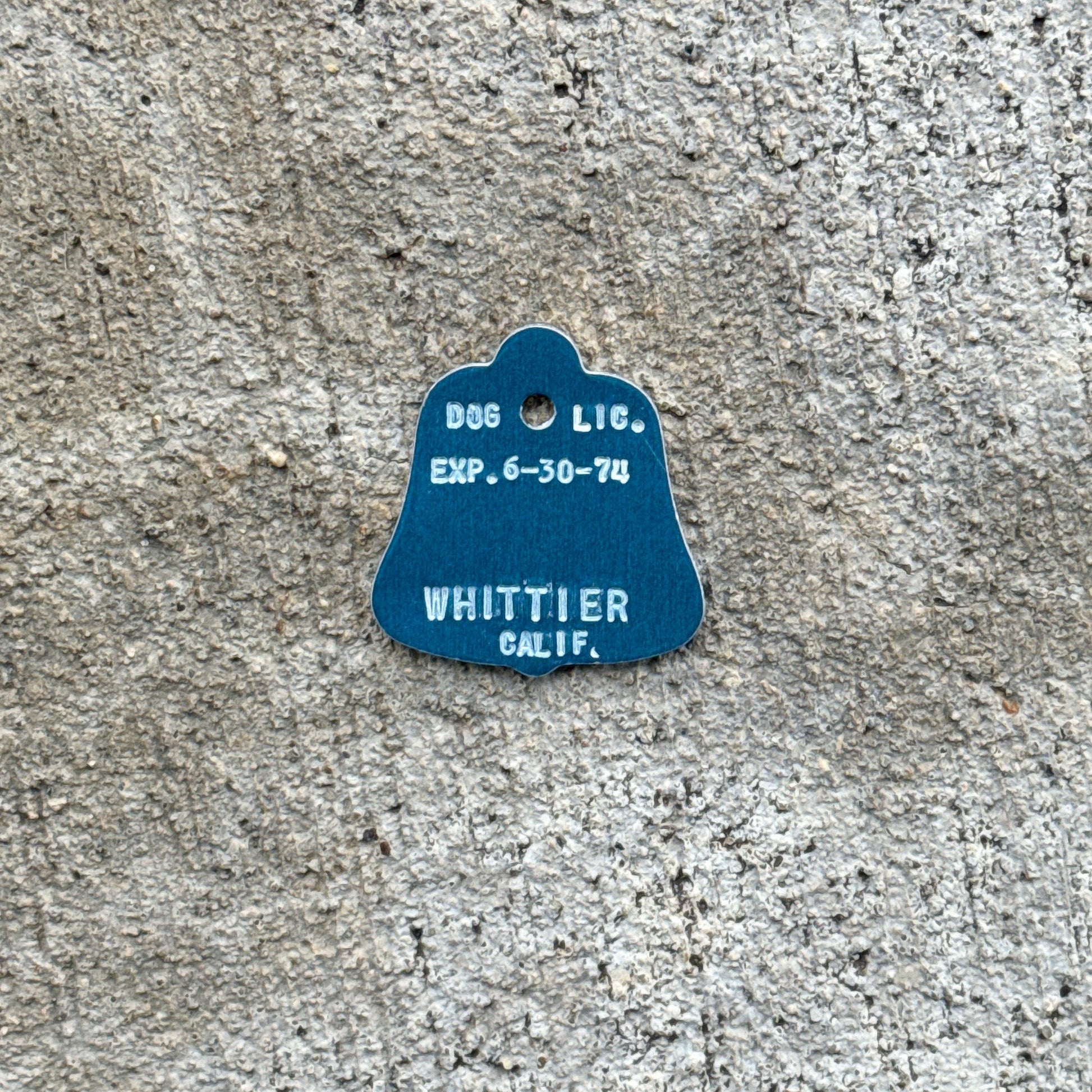 Photo of a 1974 California Dog License Auto Tag Garage Decor Vintage Whittier with original patina