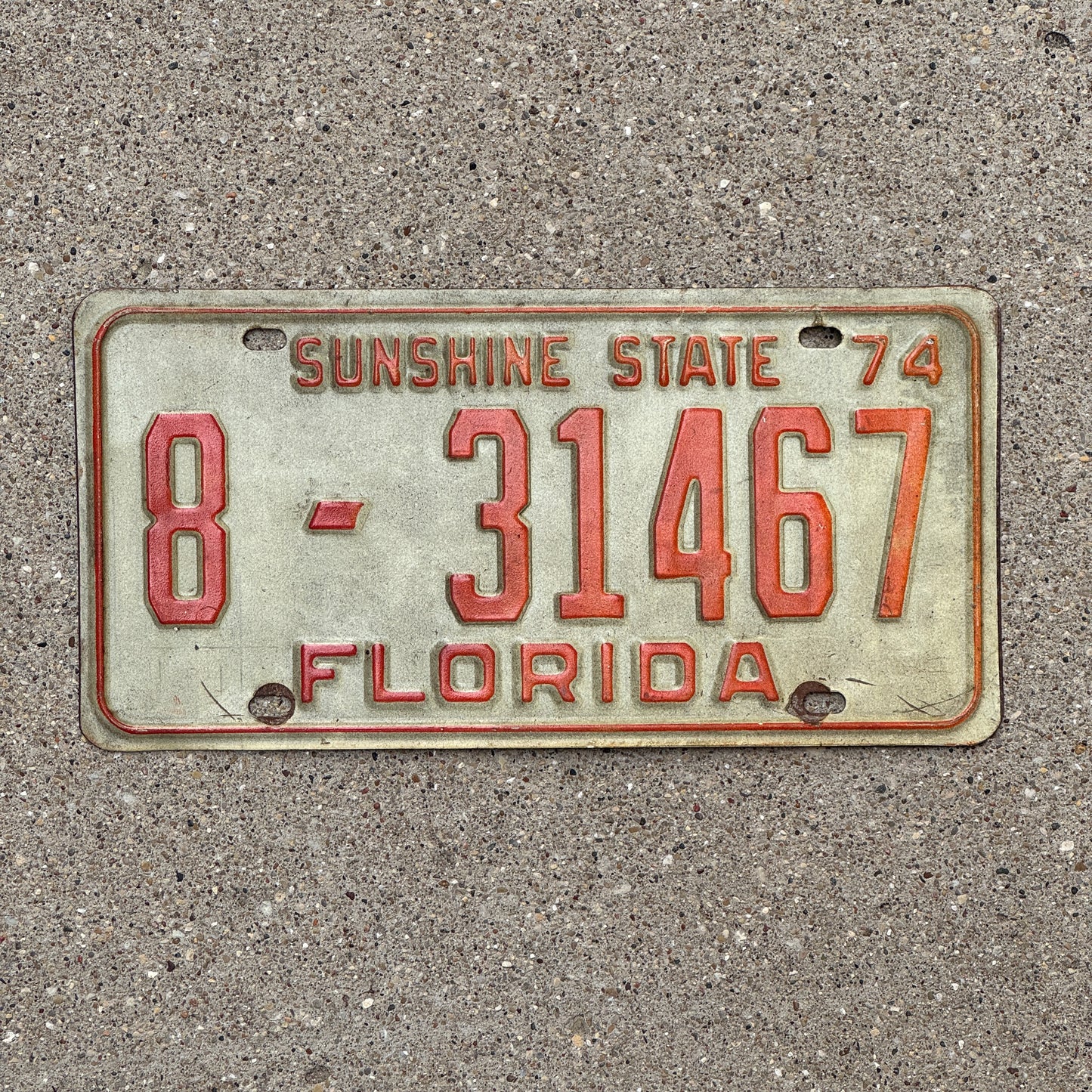 Photo of a 1974 Florida License Plate Auto Tag Garage Decor Vintage 8 31467 with original patina