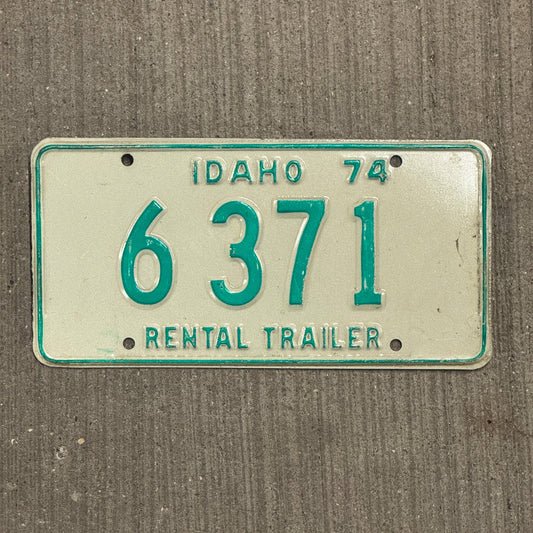 Photo of a 1974 Idaho Rental Trailer License Plate Auto Tag Garage Decor Vintage 6 371 with original patina