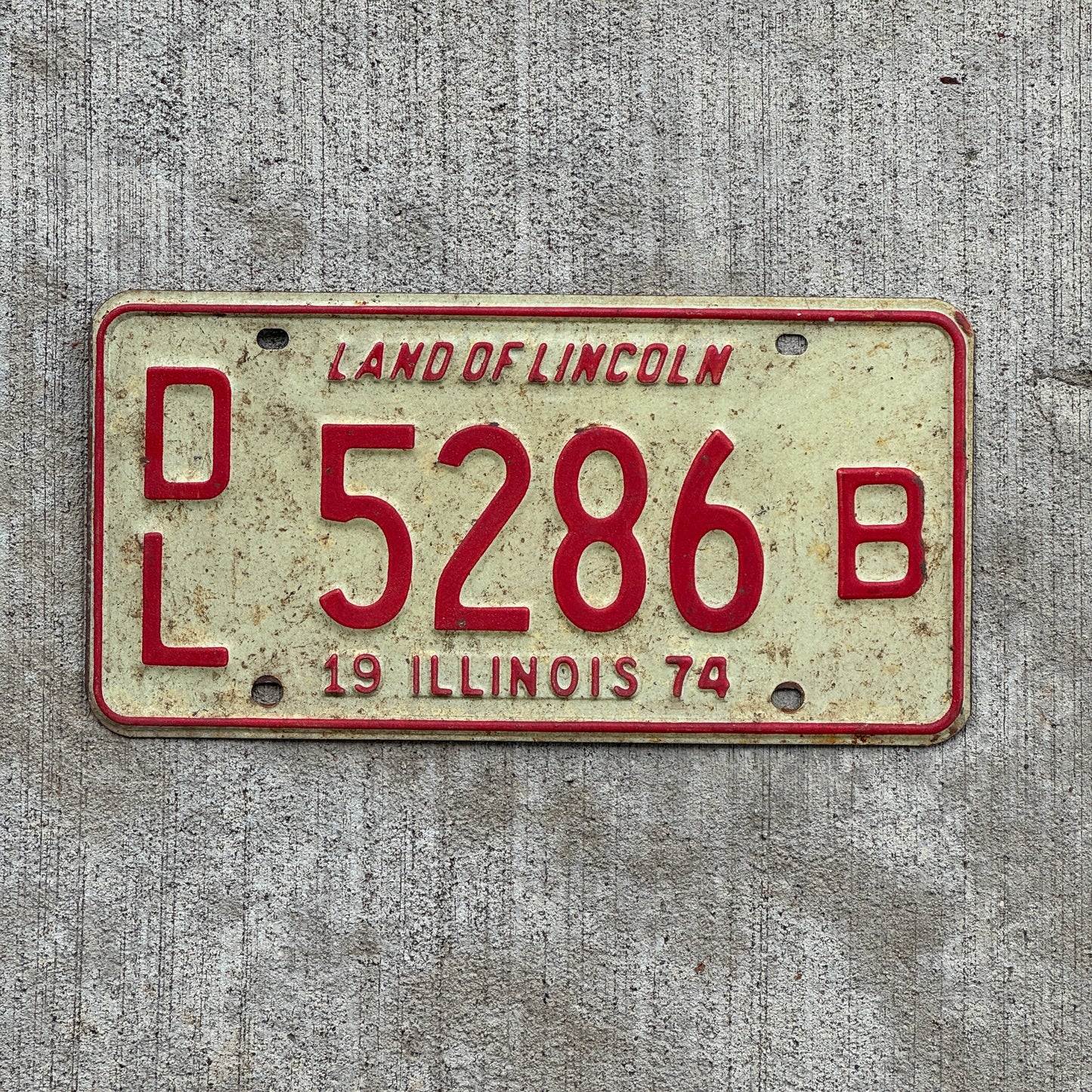 Photo of a 1974 Illinois Dealer License Plate Auto Tag 1 Vintage Garage 5286 B with original patina