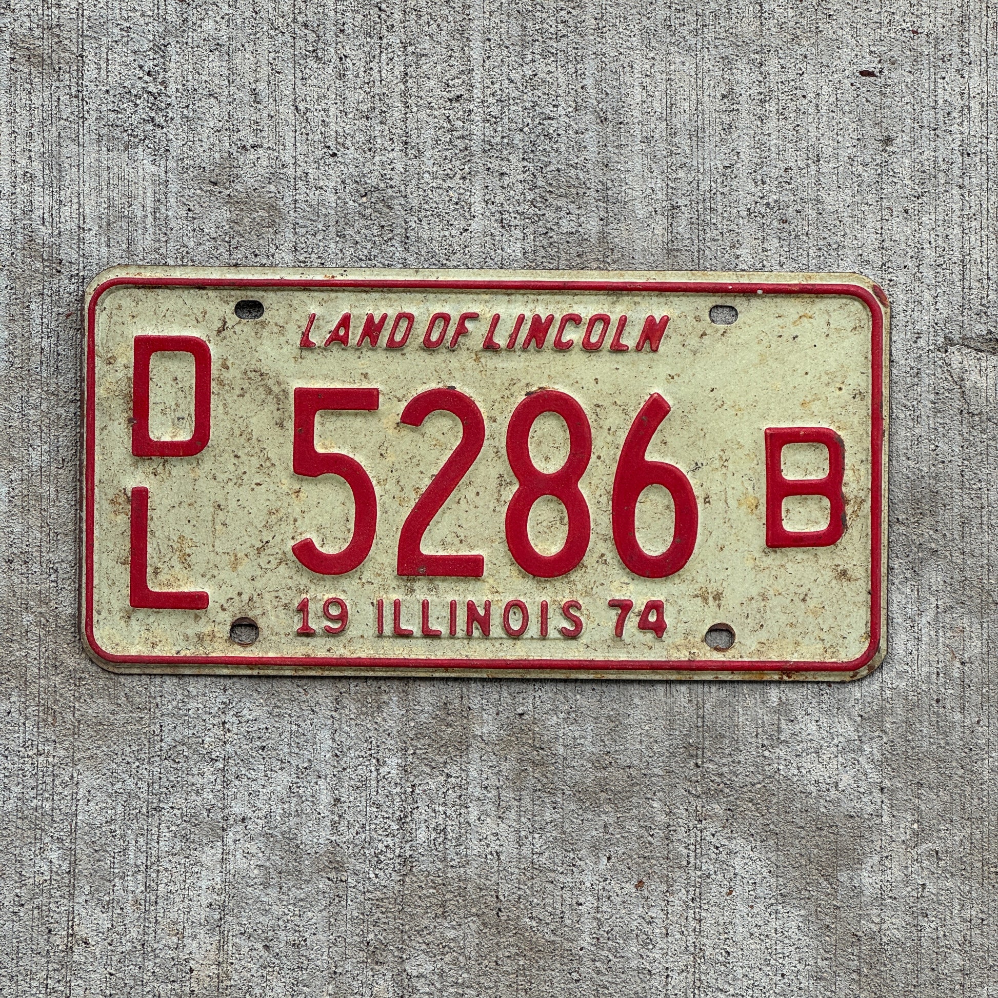 Photo of a 1974 Illinois Dealer License Plate Auto Tag 1 Vintage Garage 5286 B with original patina