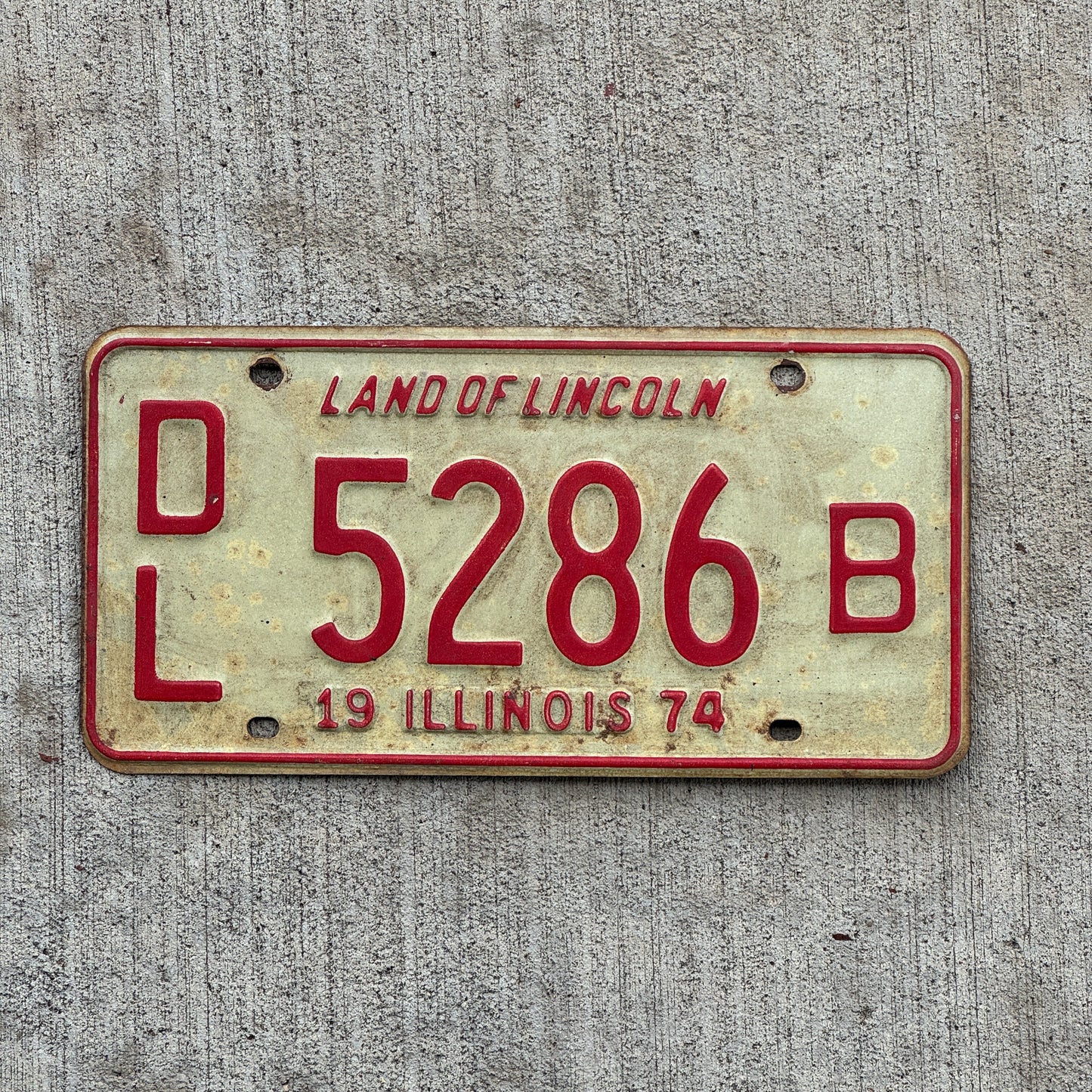 Photo of a 1974 Illinois Dealer License Plate Auto Tag 2 Vintage Garage 5286 B with original patina