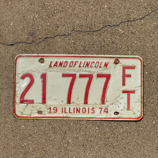Photo of a 1974 Illinois Fertilizer Trailer License Plate Auto Tag Garage Decor Vintage Repeat Repeating 21 777 FT