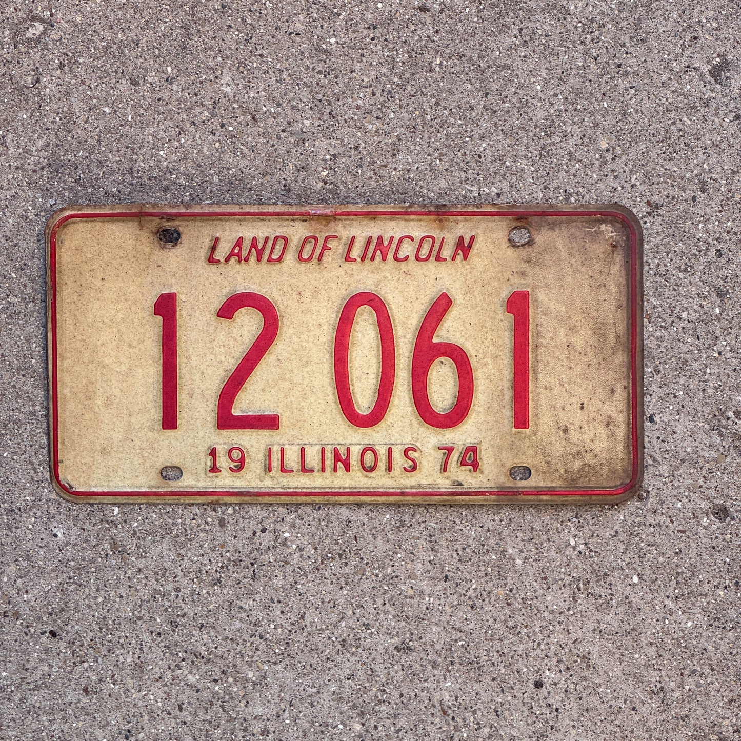 Photo of a 1974 Illinois License Plate Auto Tag 1 Vintage Garage 12 061 with original patina