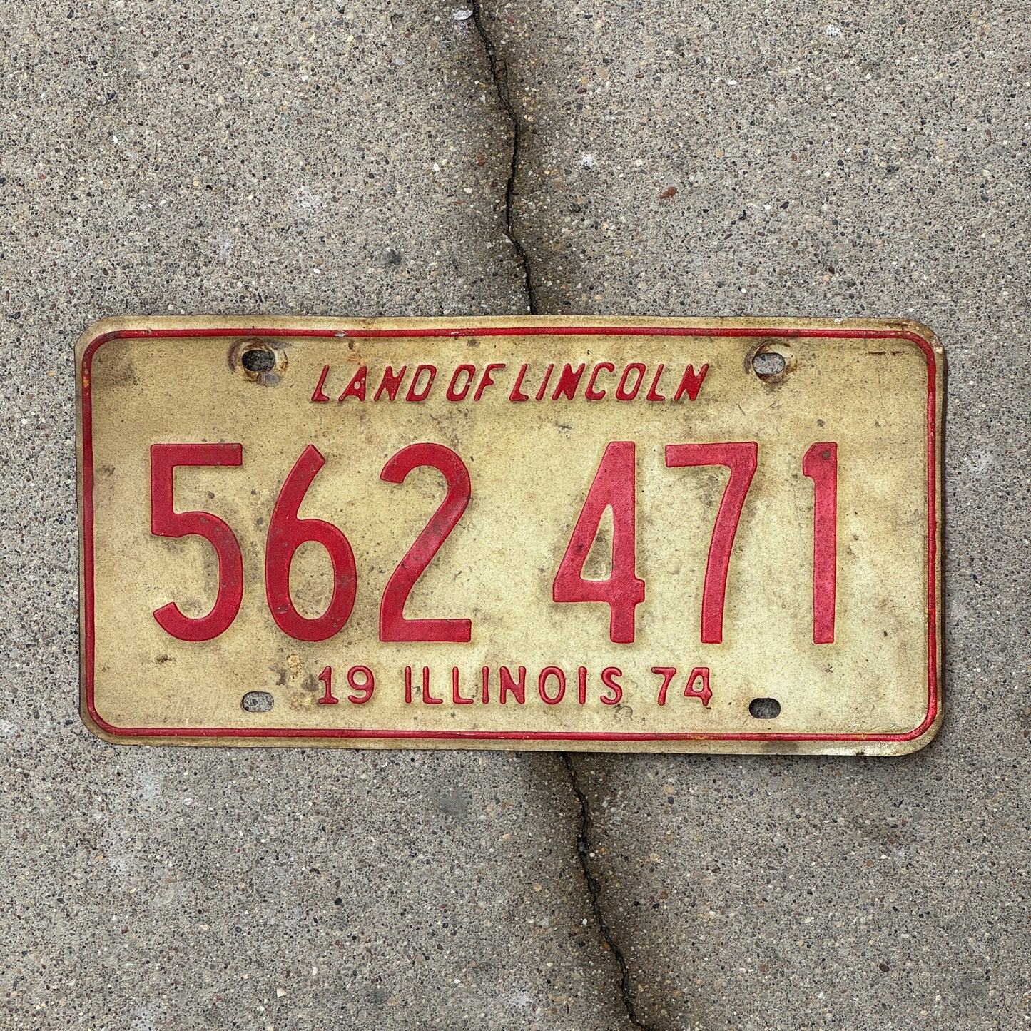 Photo of a 1974 Illinois License Plate Auto Tag 1 Vintage Garage 562 471 with original patina