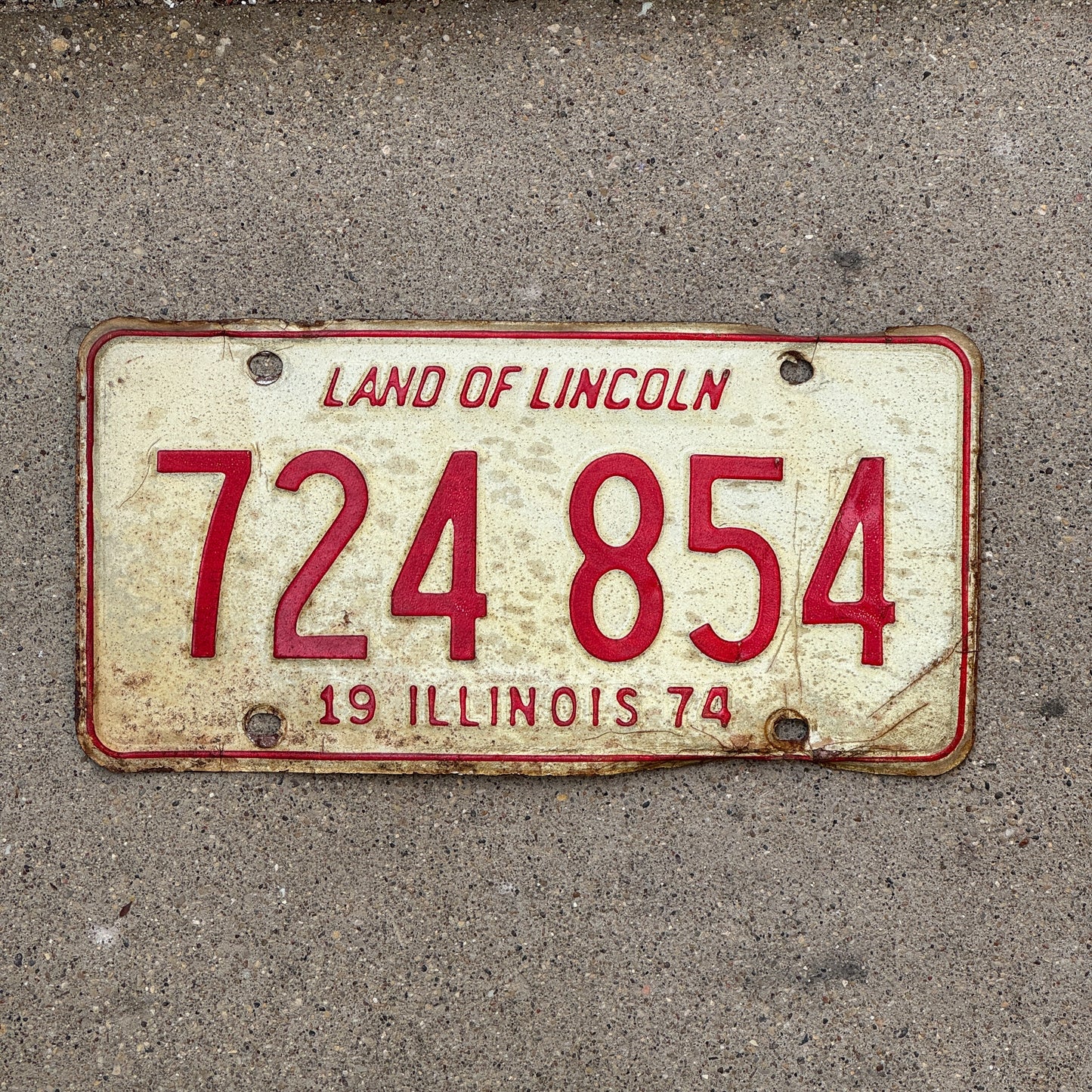 Photo of a 1974 Illinois License Plate Auto Tag 1 Vintage Garage 724 854 with original patina