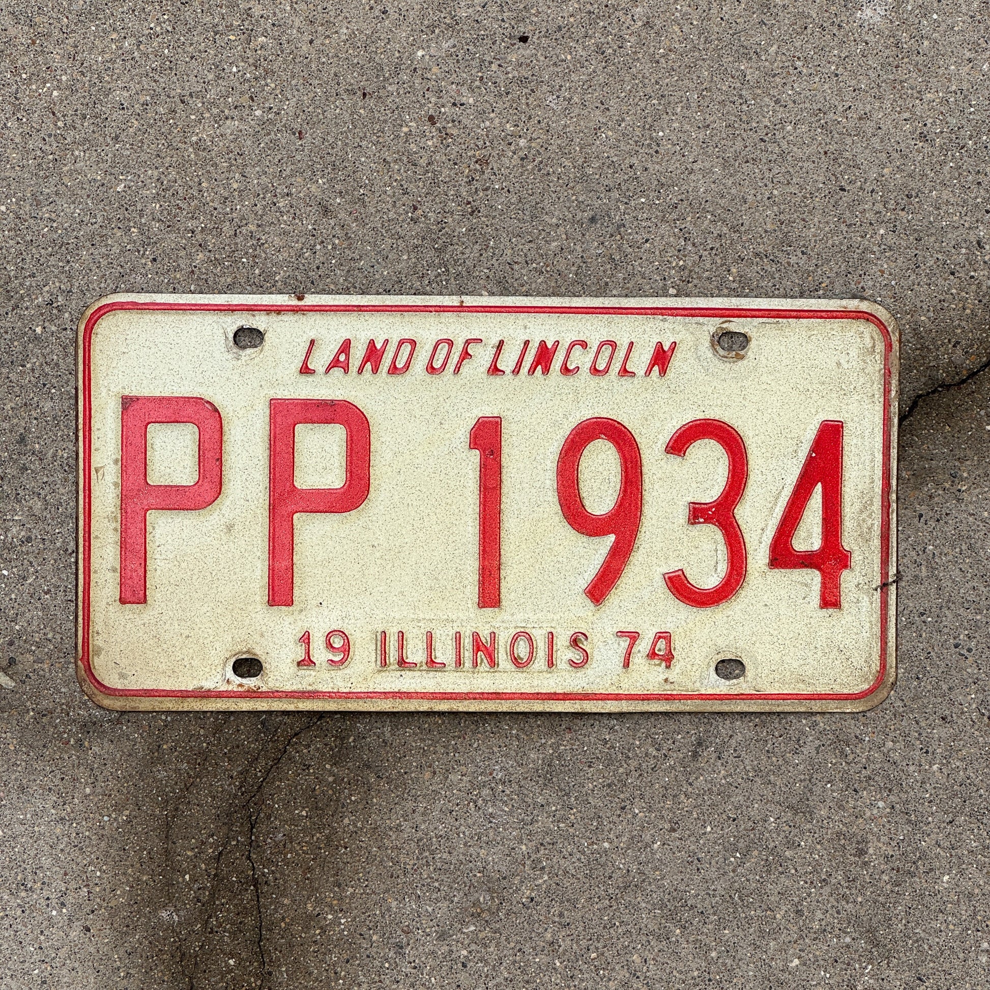Photo of a 1974 Illinois License Plate Auto Tag 1 Vintage Garage Birth Year PP 1934 with original patina