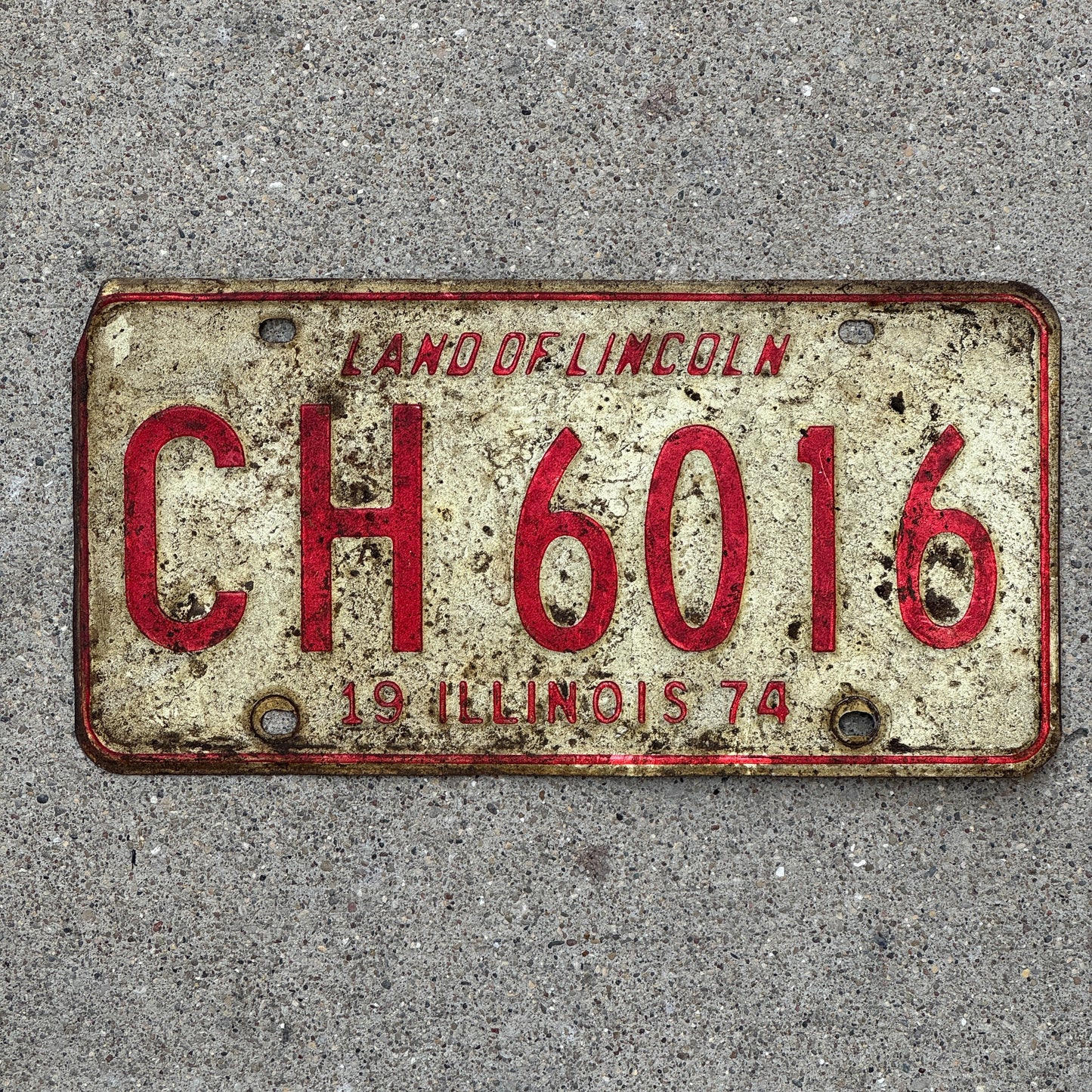 Photo of a 1974 Illinois License Plate Auto Tag 1 Vintage Garage CH 6016 with original patina