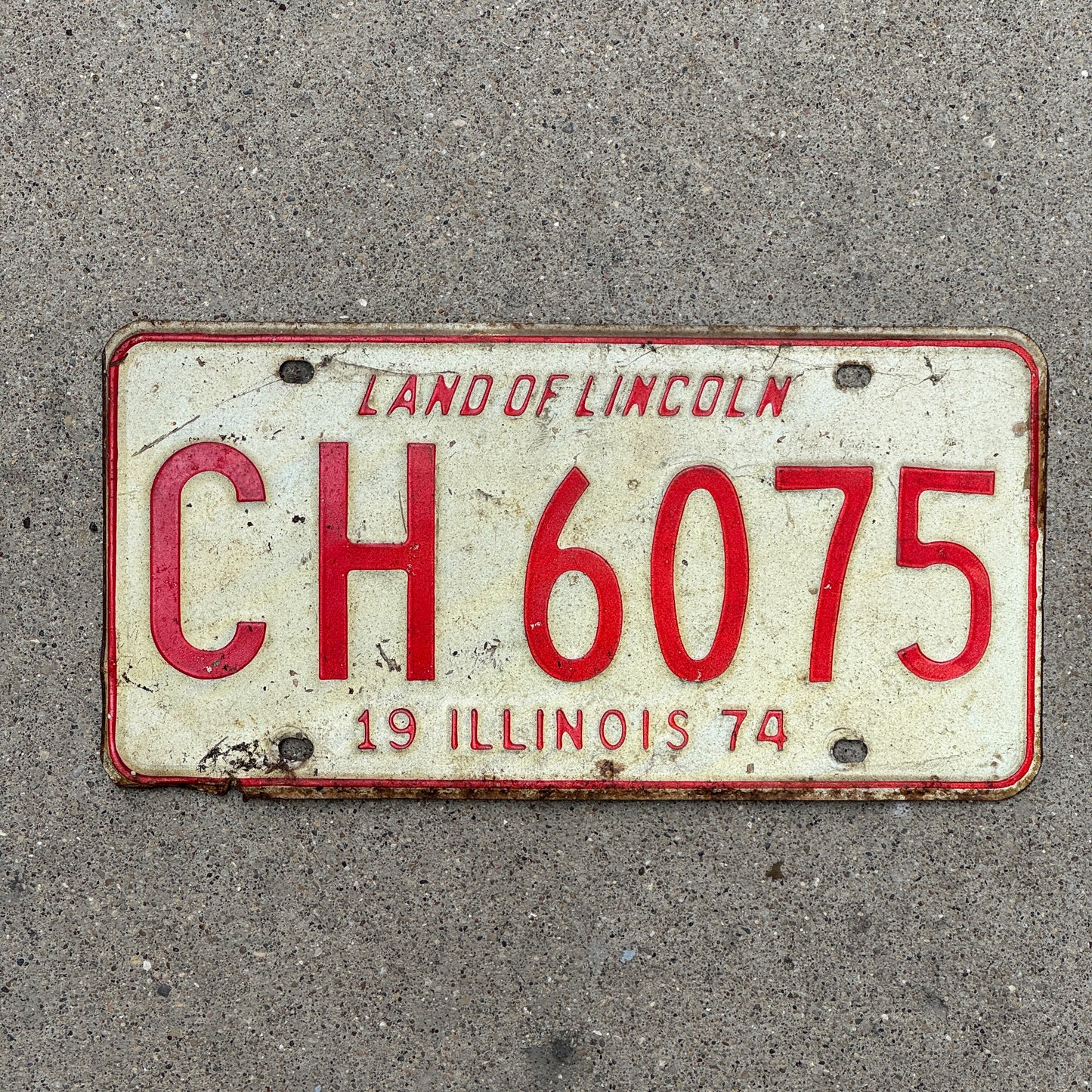 Photo of a 1974 Illinois License Plate Auto Tag 1 Vintage Garage CH 6075 with original patina