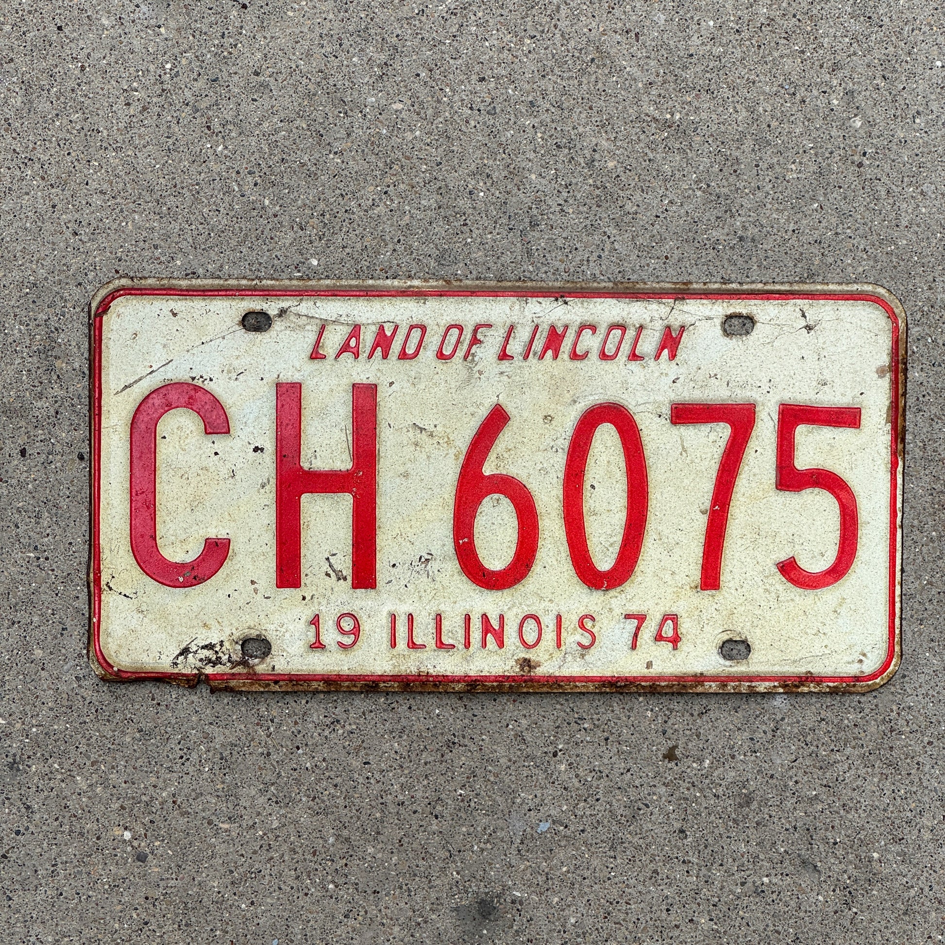 Photo of a 1974 Illinois License Plate Auto Tag 1 Vintage Garage CH 6075 with original patina