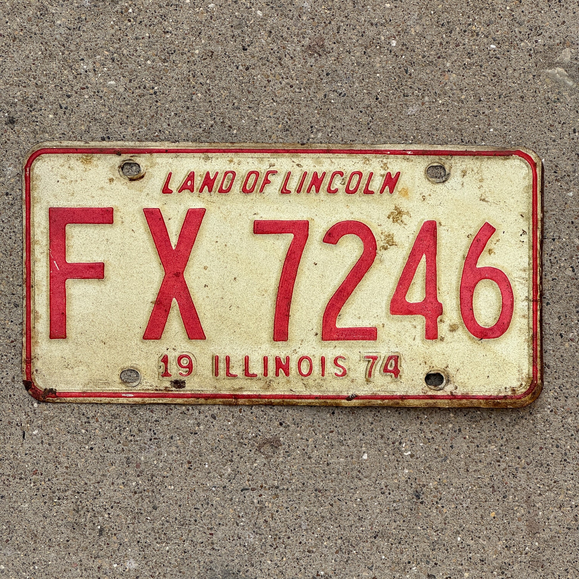 Photo of a 1974 Illinois License Plate Auto Tag 1 Vintage Garage FX 7246 with original patina