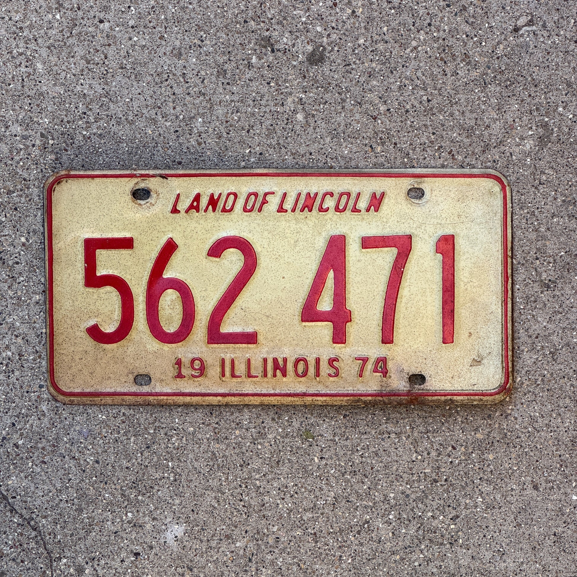 Photo of a 1974 Illinois License Plate Auto Tag 2 Vintage Garage 562 471 with original patina