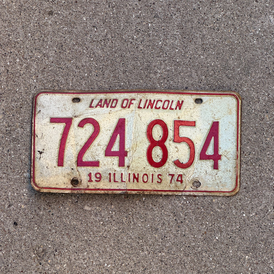 Photo of a 1974 Illinois License Plate Auto Tag 2 Vintage Garage 724 854 with original patina