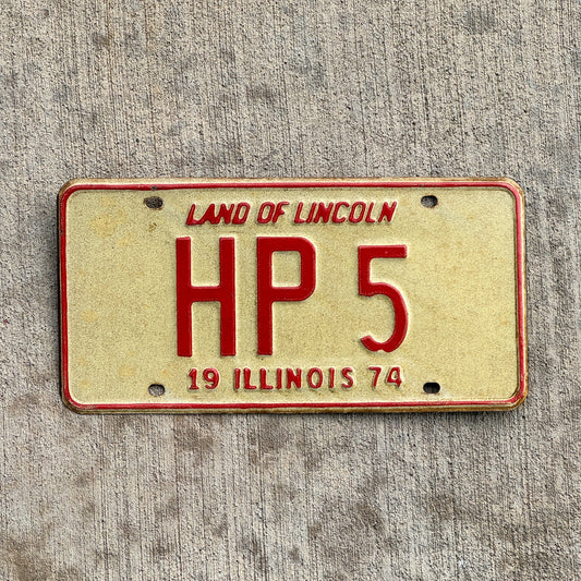 Photo of a 1974 Illinois License Plate Auto Tag Garage Decor Vintage HP 5 with original patina