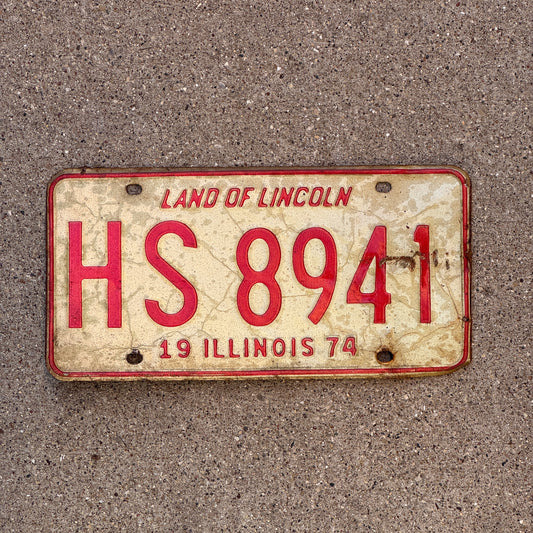 Photo of a 1974 Illinois License Plate Auto Tag Garage Decor Vintage HS 8941 with original patina