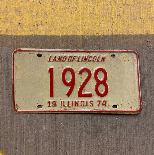 Photo of a 1974 Illinois License Plate Auto Tag Garage Decor Vintage Low Number Four Digit 1928 with original patina