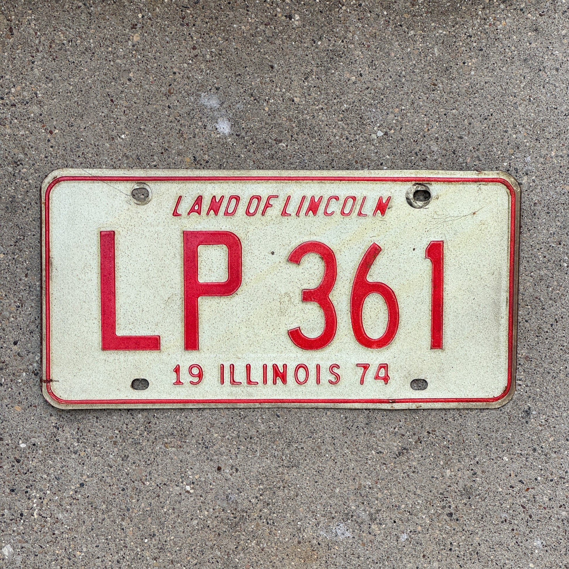 Photo of a 1974 Illinois License Plate Auto Tag Garage Decor Vintage LP 361 with original patina