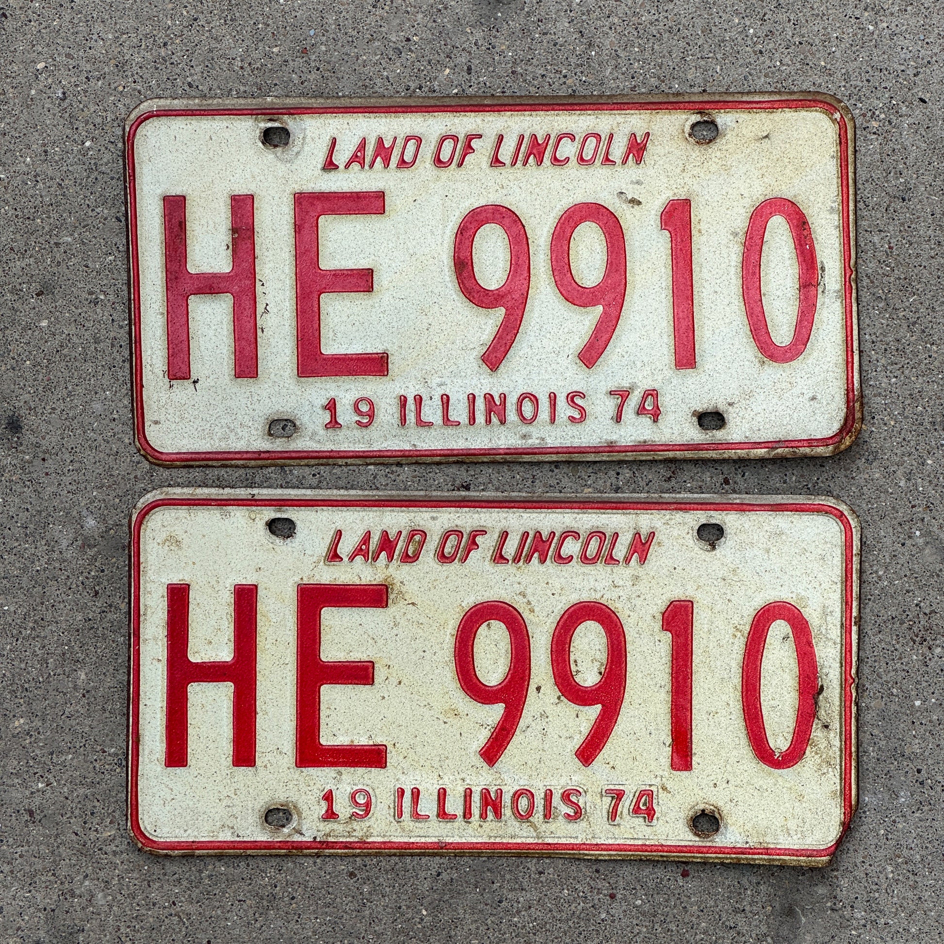 Photo of a 1974 Illinois License Plate Pair Auto Tag Garage Decor Vintage HE 9910 with original patina