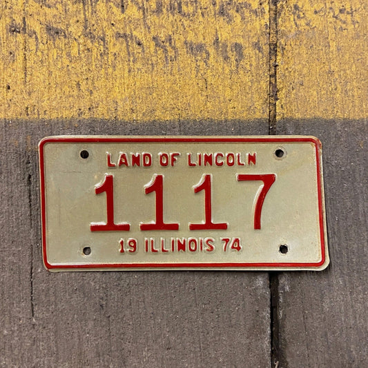 Photo of a 1974 Illinois Motorcycle License Plate Auto Tag Garage Decor Vintage Low Number Four Digit 420 Weed 1117 with original patina