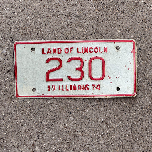 Photo of a 1974 Illinois Motorcycle License Plate Auto Tag Garage Decor Vintage Low Number Three Digit 230 with original patina