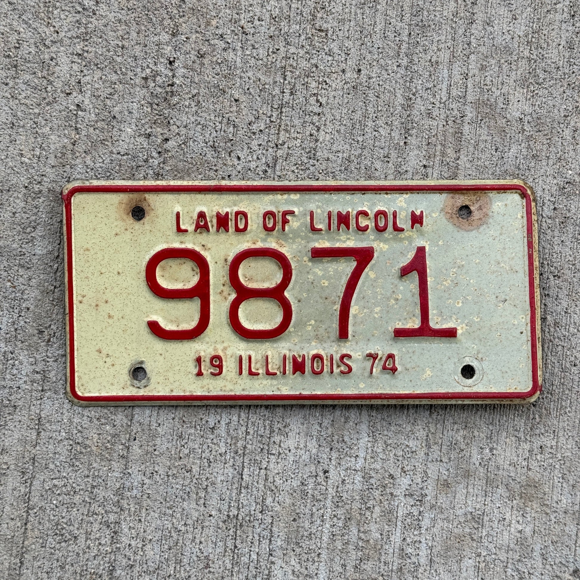 Photo of a 1974 Illinois MOTORCYCLE License Plate Auto Tag Garage Decor Vintage 9871