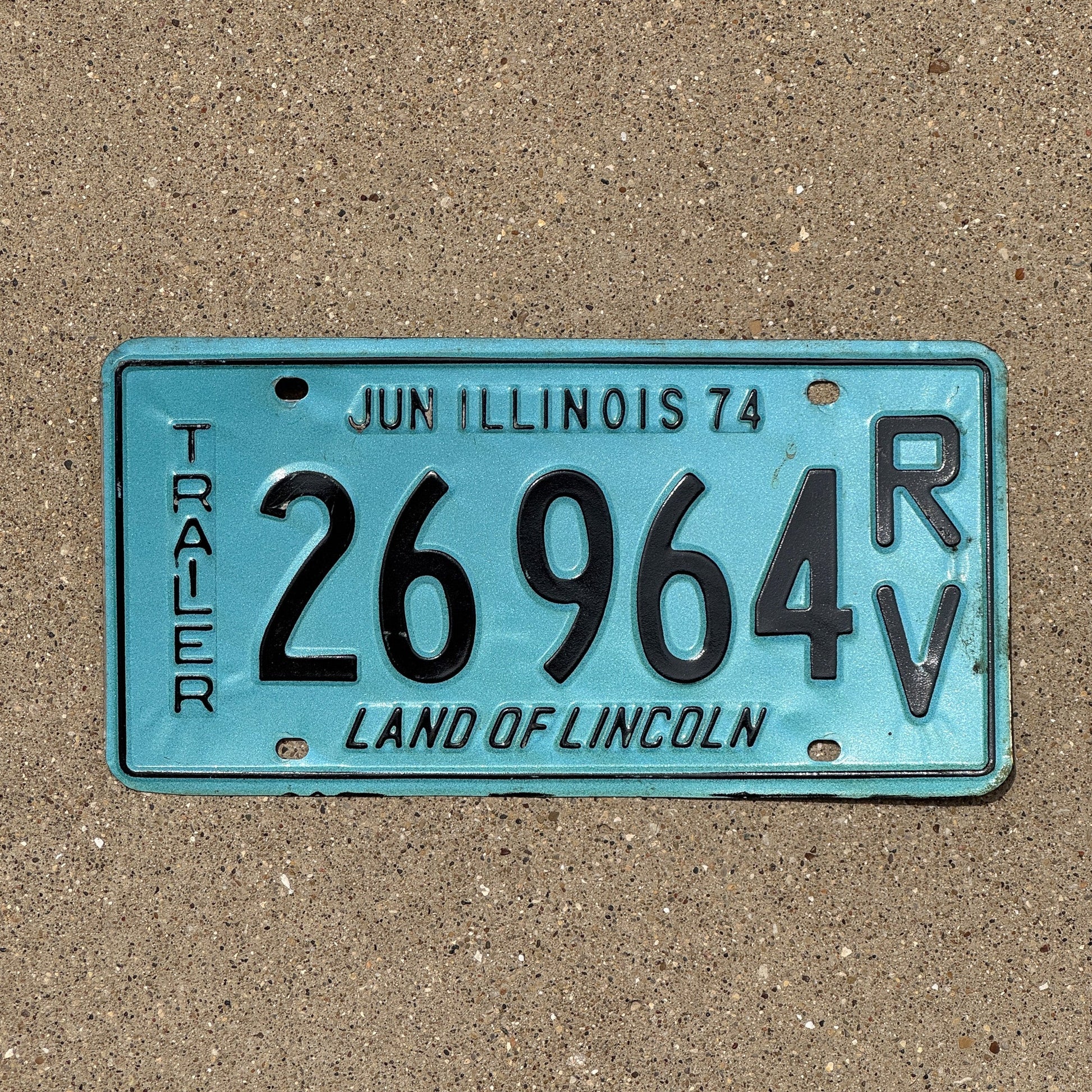 Photo of a 1974 Illinois RV Trailer License Plate Auto Tag Garage Decor Vintage 26 964 RV