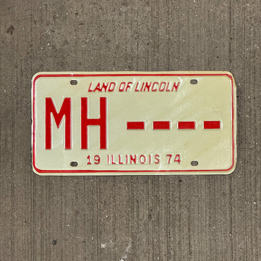 Photo of a 1974 Illinois SAMPLE License Plate Auto Tag Garage Decor Vintage MH