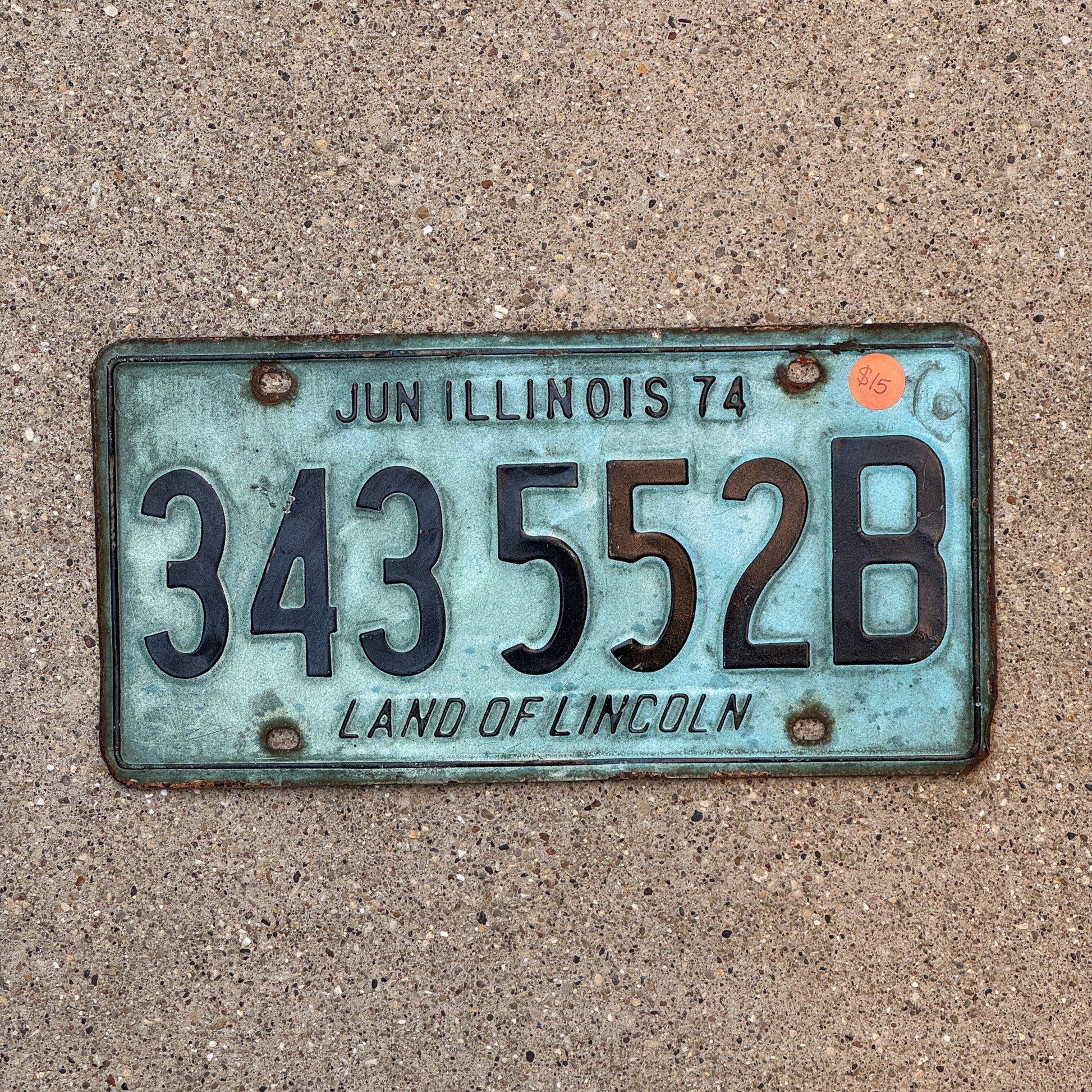 Photo of a 1974 Illinois Truck License Plate Auto Tag Garage Decor Vintage 343 552 B with original patina