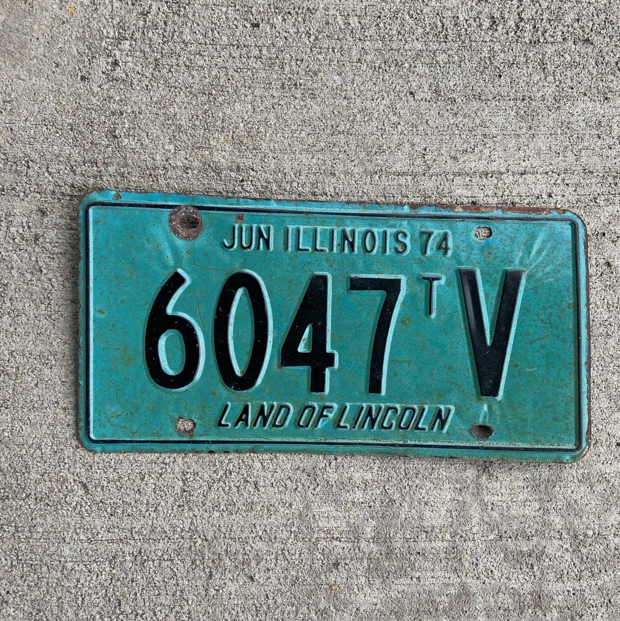 Photo of a 1974 Illinois Truck Tractor License Plate Auto Tag Garage Decor Vintage 6047 TV with original patina