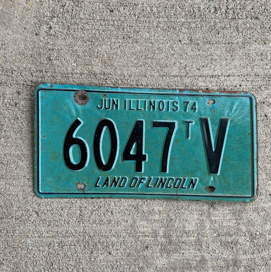 Photo of a 1974 Illinois Truck Tractor License Plate Auto Tag Garage Decor Vintage 6047 TV with original patina