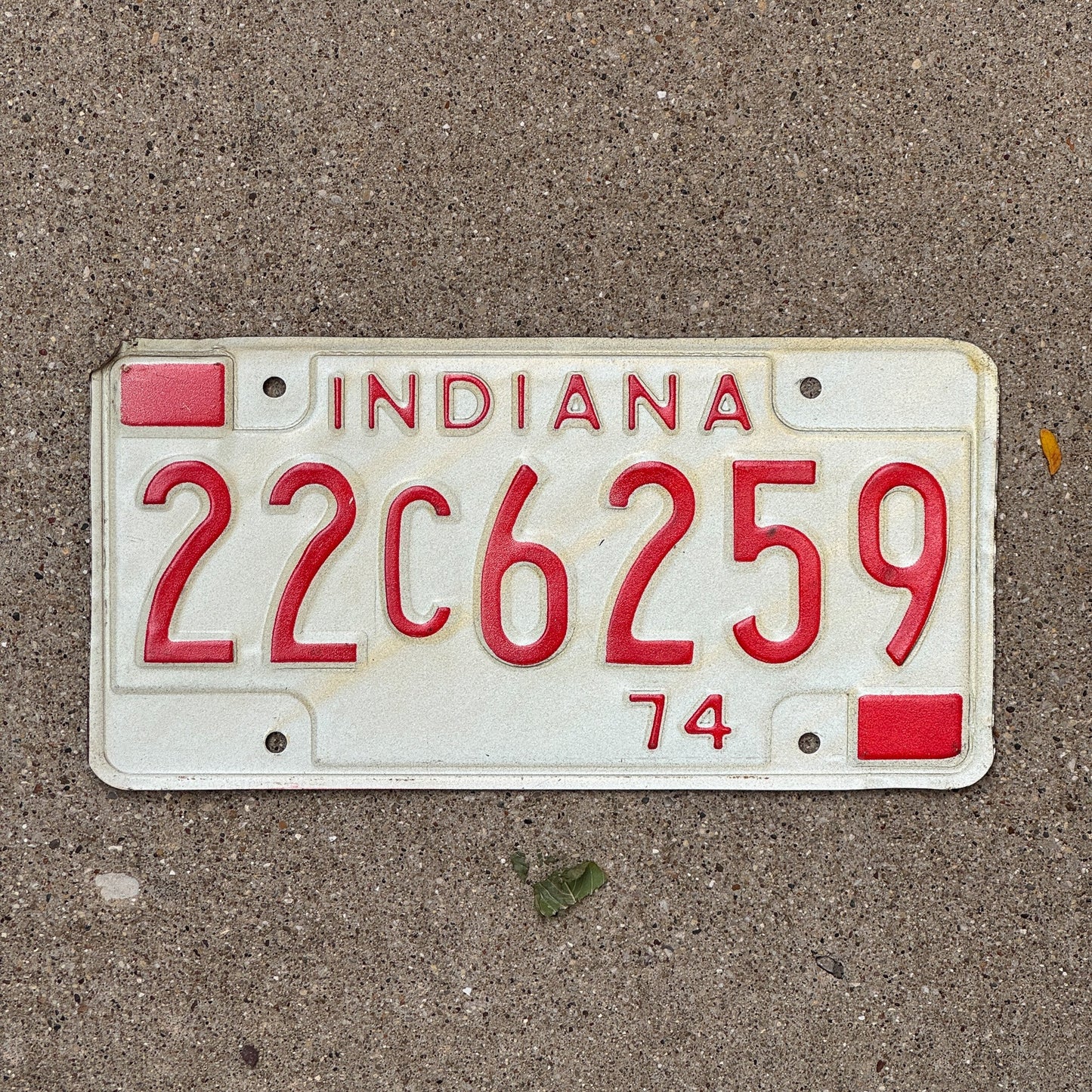 Photo of a 1974 Indiana License Plate Auto Tag Garage Decor Vintage 22 C 6259 with original patina