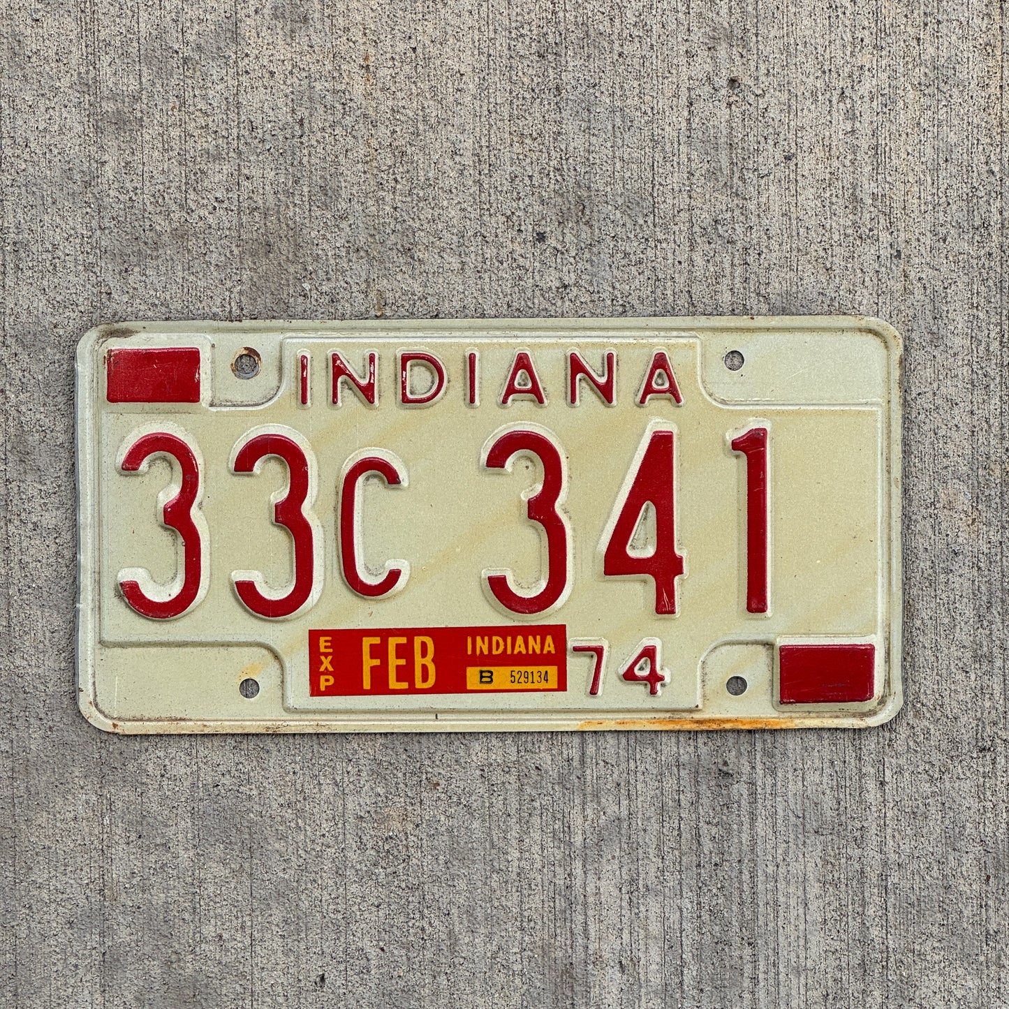Photo of a 1974 Indiana License Plate Auto Tag Garage Decor Vintage 33 C 341 with original patina
