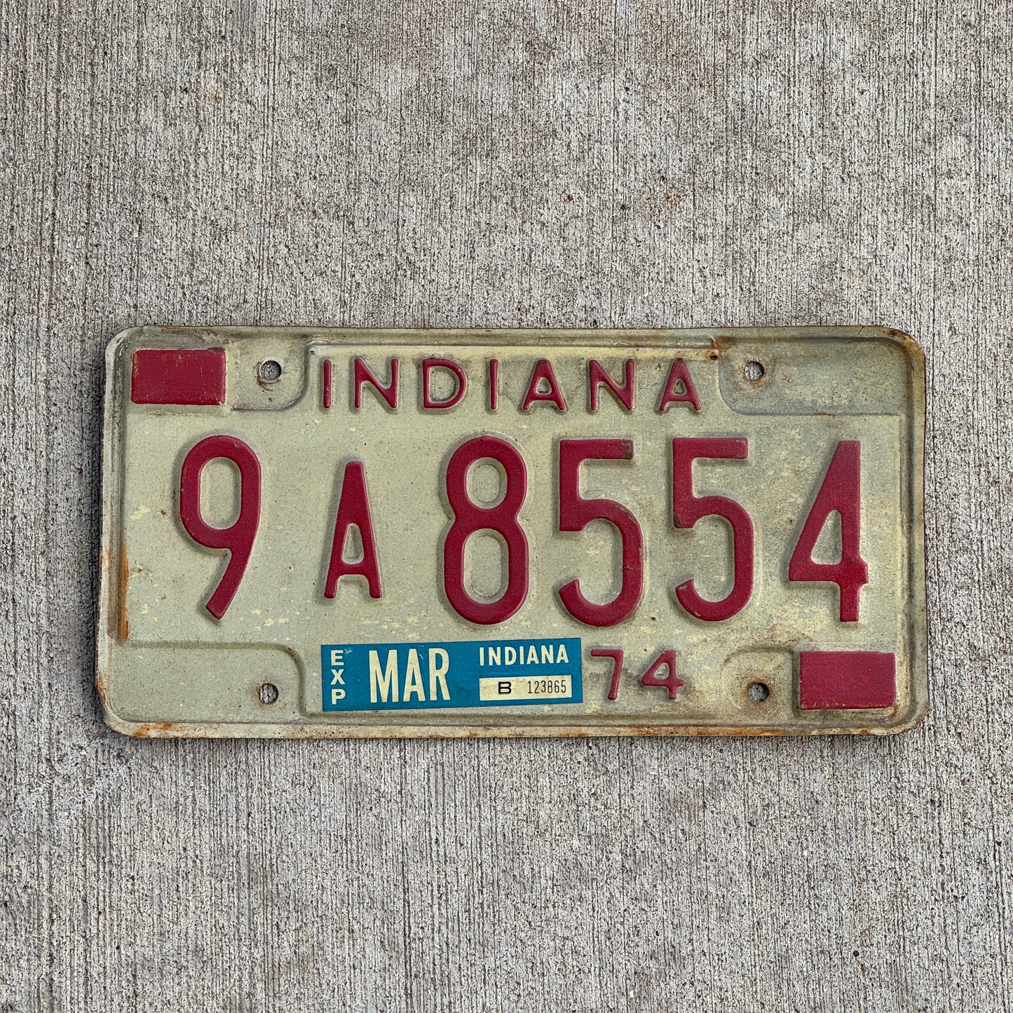 Photo of a 1974 Indiana License Plate Auto Tag Garage Decor Vintage 9 A 8554 with original patina