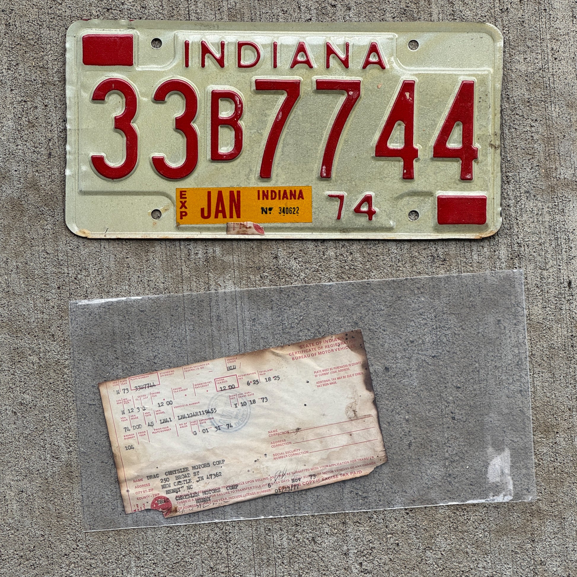 Photo of a 1974 Indiana License Plate Auto Tag Garage Decor Vintage With Registration 33 B 7744 with original patina