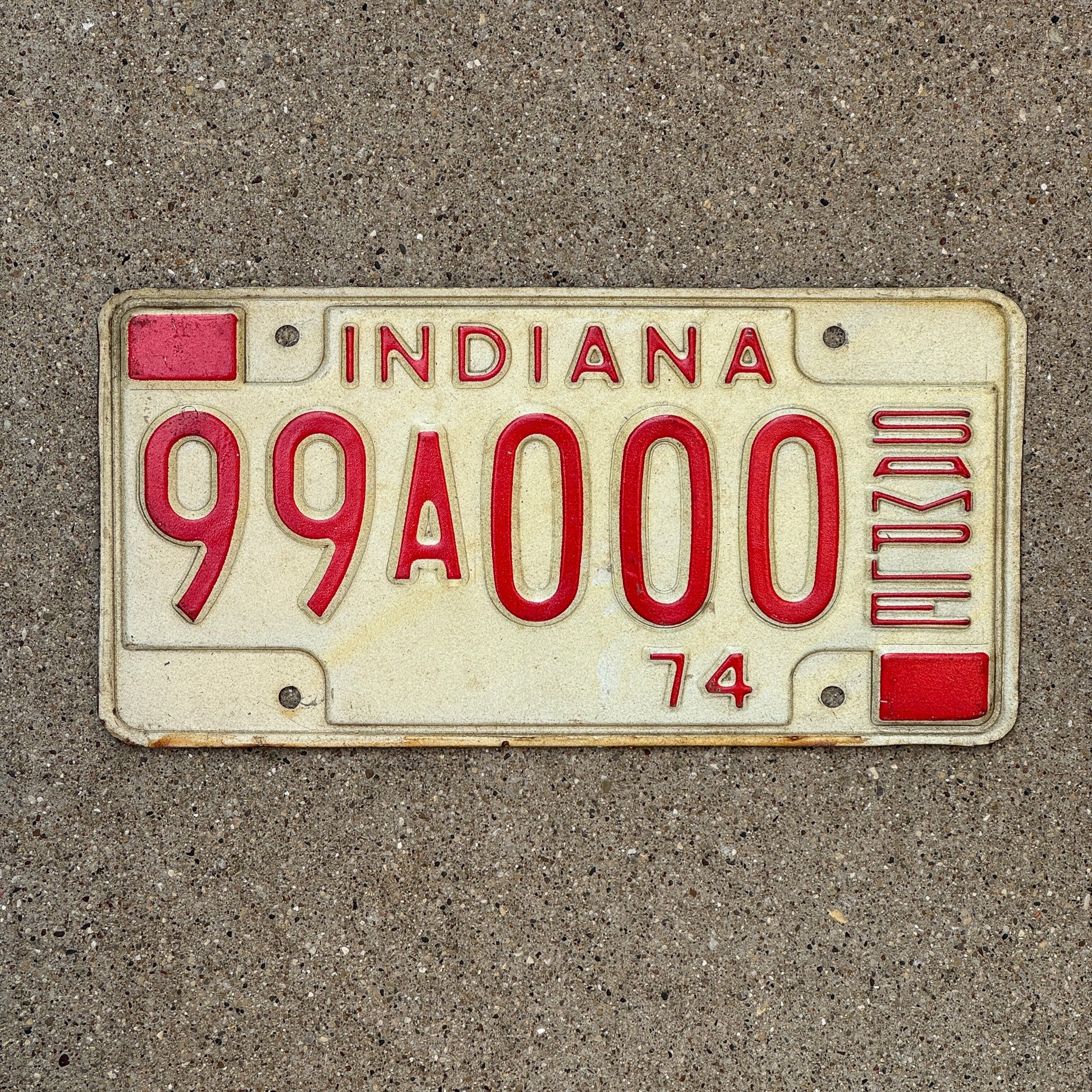 Photo of a 1974 Indiana Sample License Plate Auto Tag 1 Garage Decor 99A000 with original patina