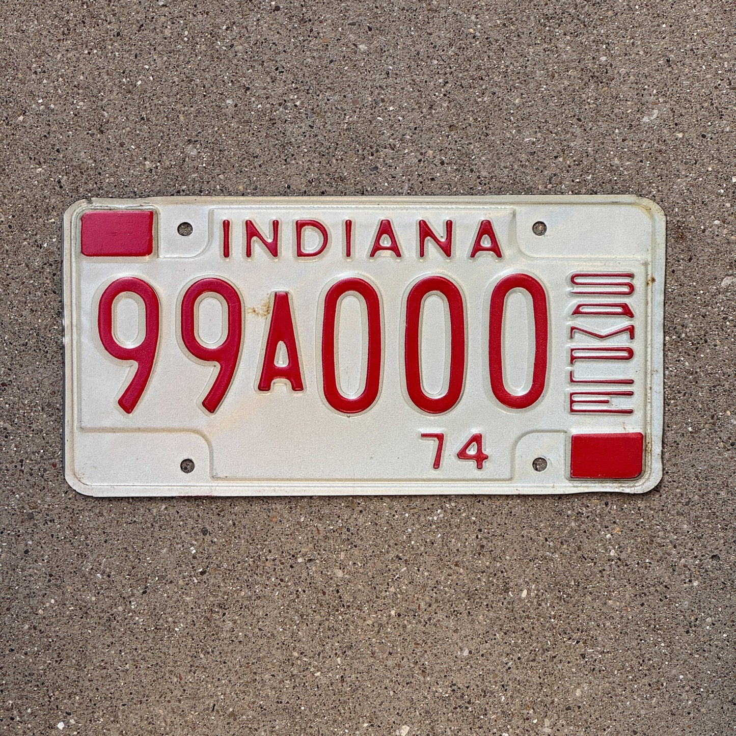 Photo of a 1974 Indiana Sample License Plate Auto Tag 2 Garage Decor 99A000 with original patina